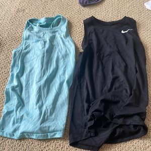 two nike tank tops